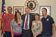 <b>Maxfield and the Scholet Family:</b> The Scholet family of Clearwater, FL completed their goal to visit all 50 state capitols; it took the family seven years to complete. Wyoming was the 50th state capitol they visited. From left:  Rand and Nicole Scholet, Secretary of State Max Maxfield, Cyndee and Brandon Scholet.