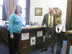 <b>Students Display Artwork in Secretary's Office </b> Secretary Maxfield, Beth All, and Jessica Baldwin work on displaying the winners of the 'Life is Sweet' student artwork. (February 2013)