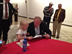 At a public reception at the Sweetwater County Events Complex, Governor Mead finds a moment to read to a future leader. (May 2013)